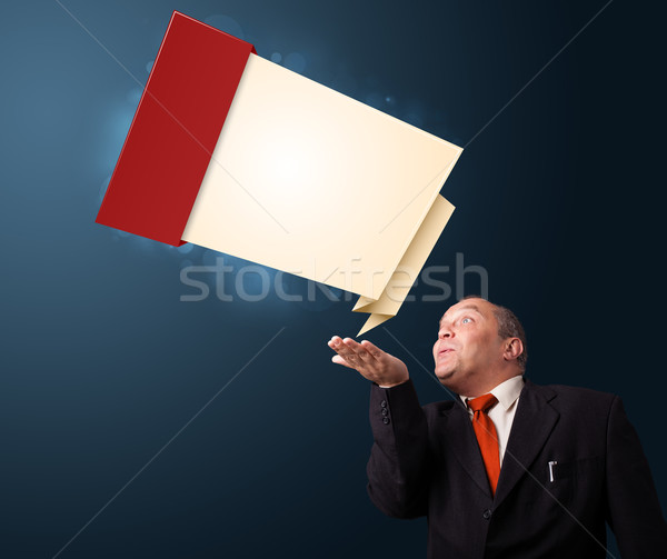 Stock photo: funny businessman presenting modern origami copy space