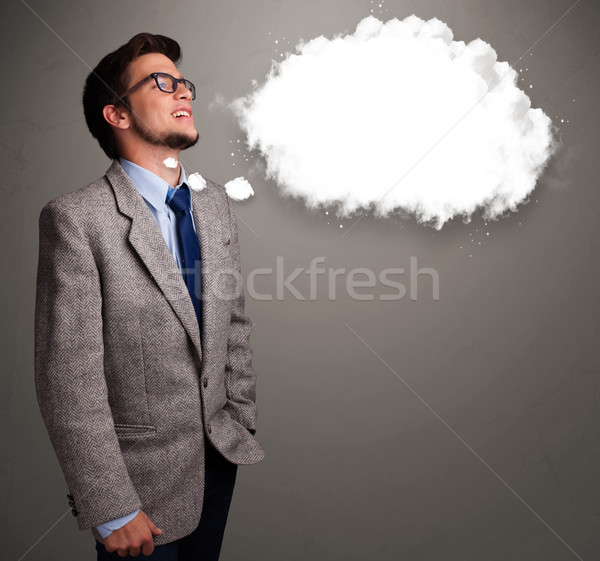 Good-looking young man thinking about cloud speech or thought bubble Stock photo © ra2studio