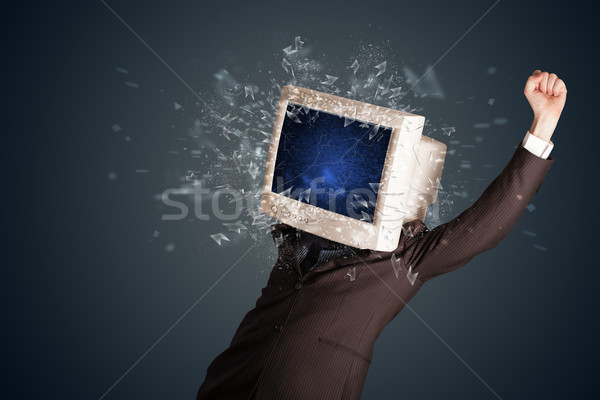 Computer monitor screen exploding on a young persons head  Stock photo © ra2studio