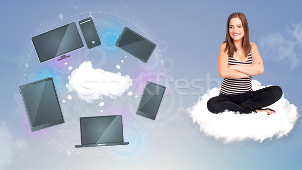 Young girl sitting on cloud enjoying cloud network service Stock photo © ra2studio