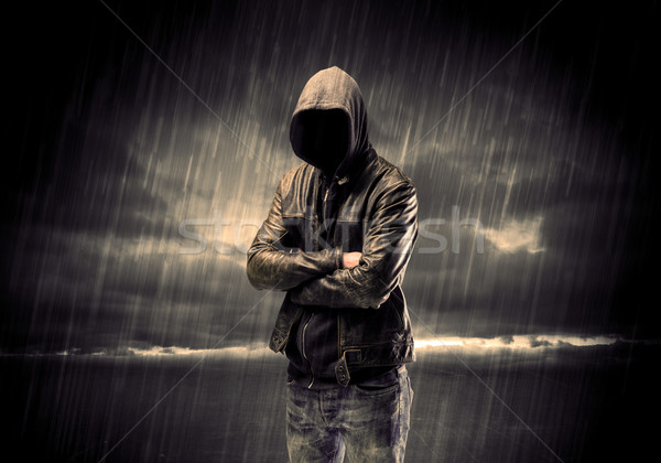 Anonymous terrorist in hoodie at night Stock photo © ra2studio