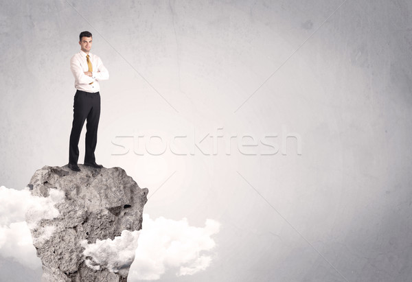 Best salesman on cliff in clear space Stock photo © ra2studio