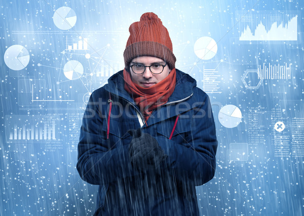 Young hipster shivering with graphs, reports and chart concept Stock photo © ra2studio