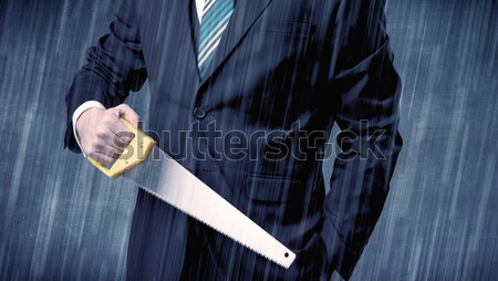 Employer standing with tool on his hand Stock photo © ra2studio