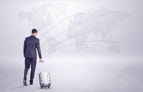 Businessman planning his trip over the world Stock photo © ra2studio