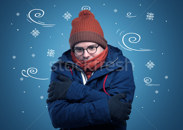 Frozen boy with doodled snowflake and windy concept Stock photo © ra2studio