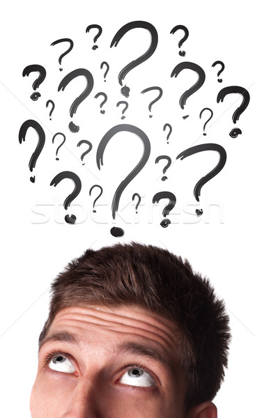 Caucasian male adult has way too many questions in his head  Stock photo © ra2studio