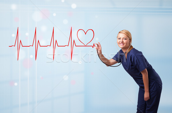 Young nurse listening to abstract pulse with red heart Stock photo © ra2studio