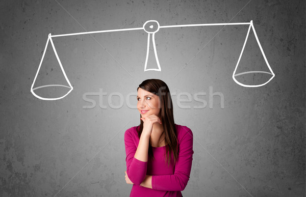 Young woman taking a decision Stock photo © ra2studio