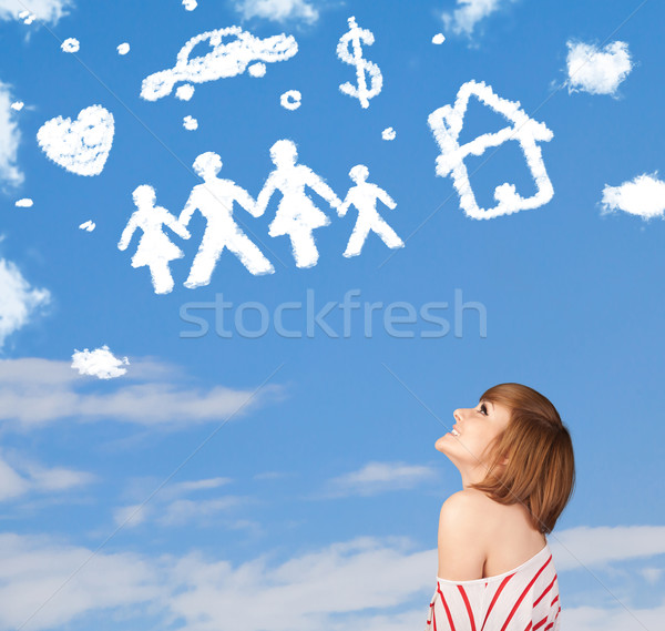 Young girl daydreaming with family and household clouds  Stock photo © ra2studio