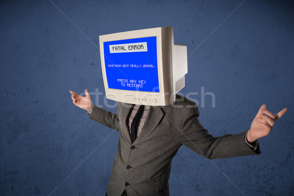 Person with a monitor head and fatal error blue screen on the di Stock photo © ra2studio