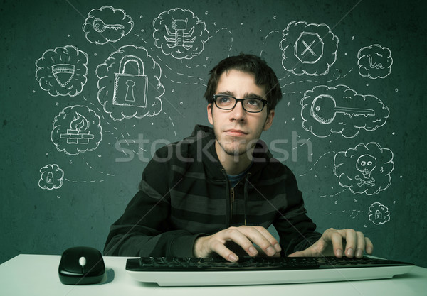 Young nerd hacker with virus and hacking thoughts Stock photo © ra2studio
