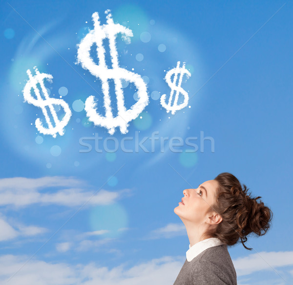 Jong meisje wijzend dollarteken wolken blauwe hemel business Stockfoto © ra2studio
