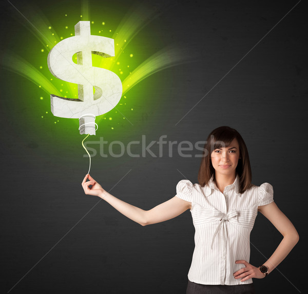 女實業家 美元符號 氣球 綠色 商業照片 © ra2studio