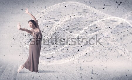 Performance ballet dancer jumping with energy explosion particle Stock photo © ra2studio
