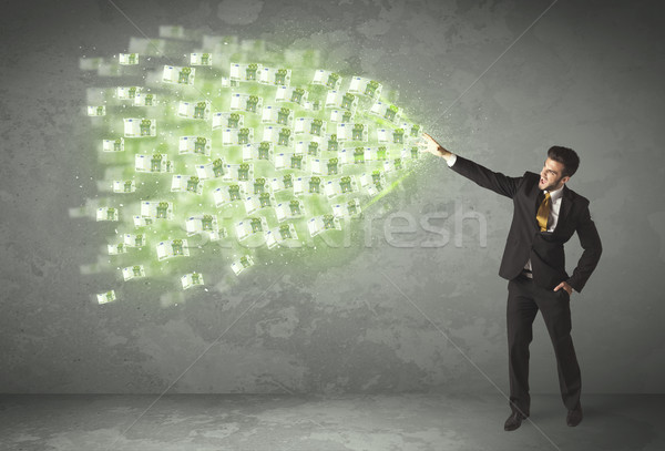 Young business person throwing money concept Stock photo © ra2studio