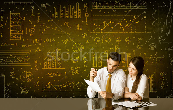 Business couple with diagram background Stock photo © ra2studio