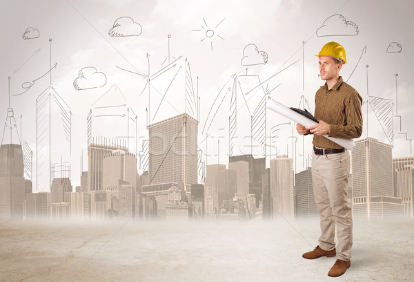 Stock photo: Business engineer planing at construction site with city backgro