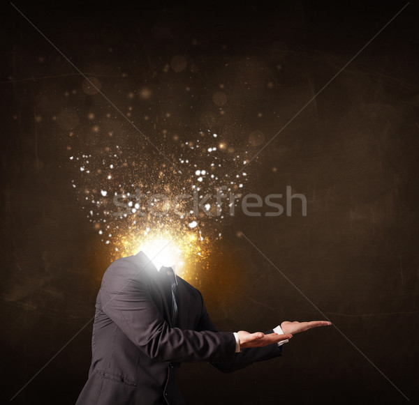 Business man with glowing exploding head Stock photo © ra2studio