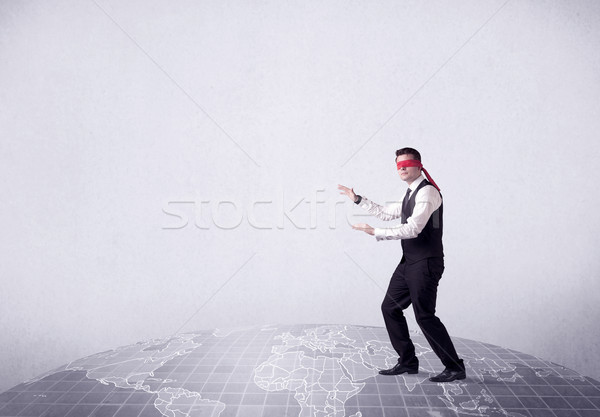 Young blindfolded businessman Stock photo © ra2studio