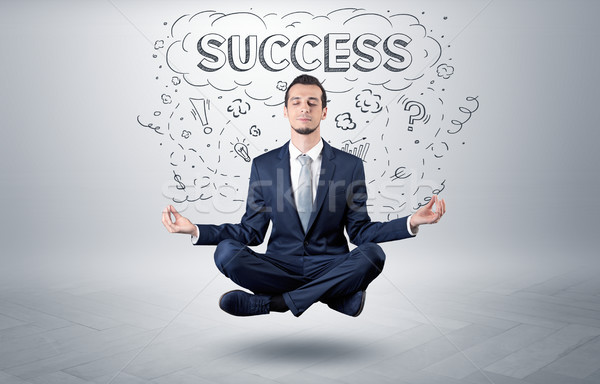 Businessman meditates with doodle concept Stock photo © ra2studio