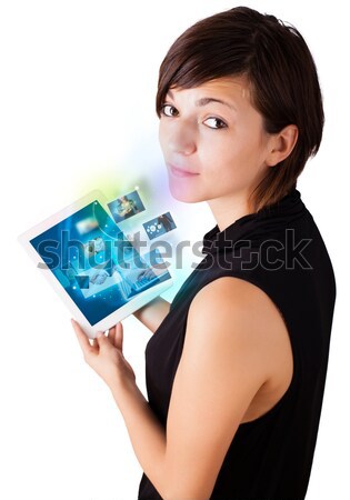 [[stock_photo]]: Jeune · femme · regarder · modernes · comprimé · sociale · icônes