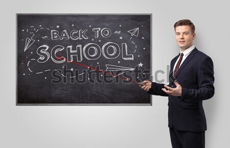 businessman gesturing with copy space Stock photo © ra2studio