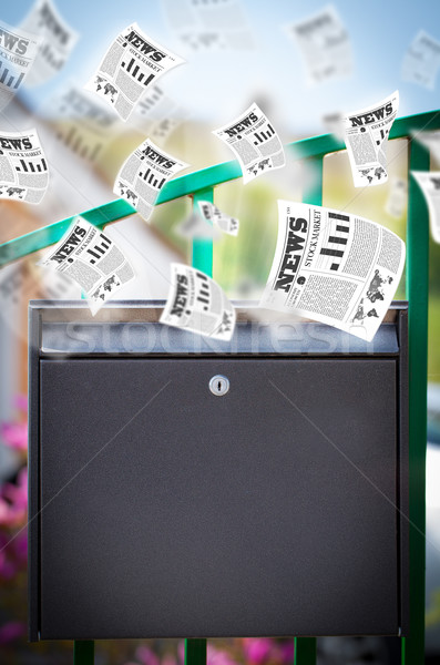 Post box with daily newspapers flying Stock photo © ra2studio