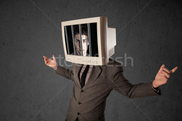 Business man with monitor on his head traped into a digital syst Stock photo © ra2studio