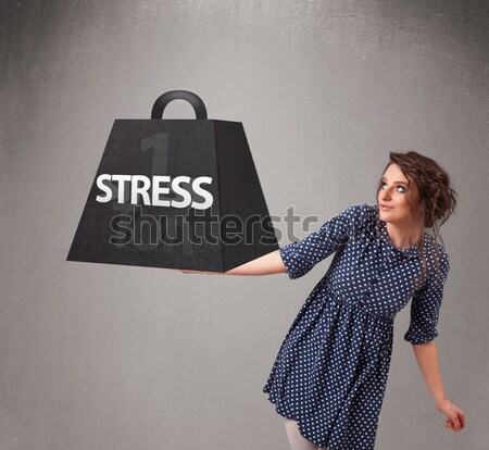 Fiatal nő tart egy stressz súly vonzó Stock fotó © ra2studio