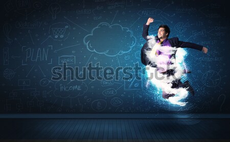 Happy business man jumping with storm cloud around him  Stock photo © ra2studio