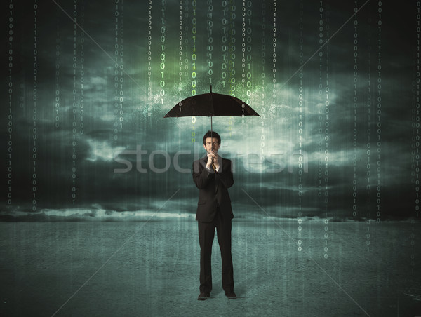 Business man standing with umbrella data protection concept Stock photo © ra2studio