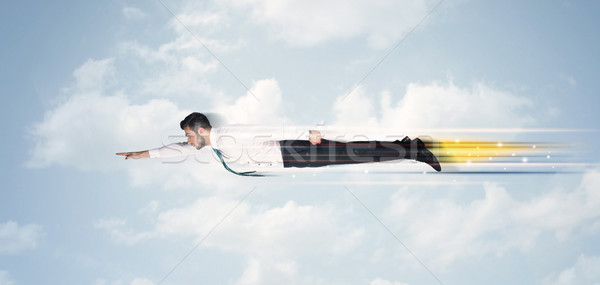 [[stock_photo]]: Heureux · homme · d'affaires · battant · rapide · ciel · nuages