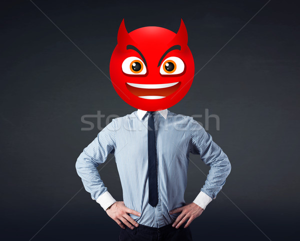 businessman wears devil smiley face Stock photo © ra2studio
