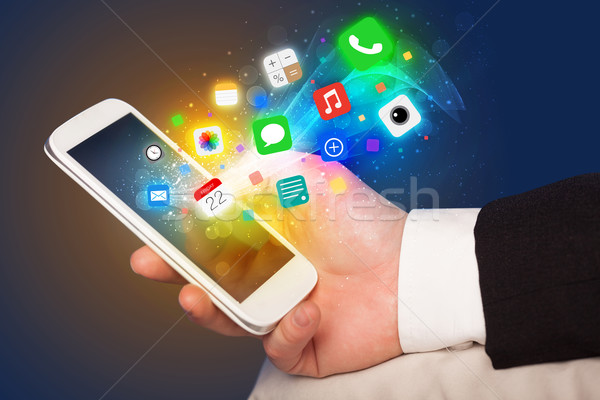 Stockfoto: Hand · smartphone · kleurrijk · app · iconen