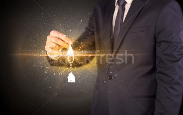 Man hand over keys Stock photo © ra2studio