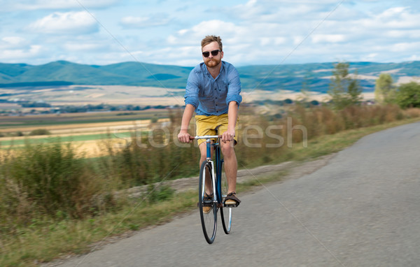 Natural young cyclist with amazing view Stock photo © ra2studio