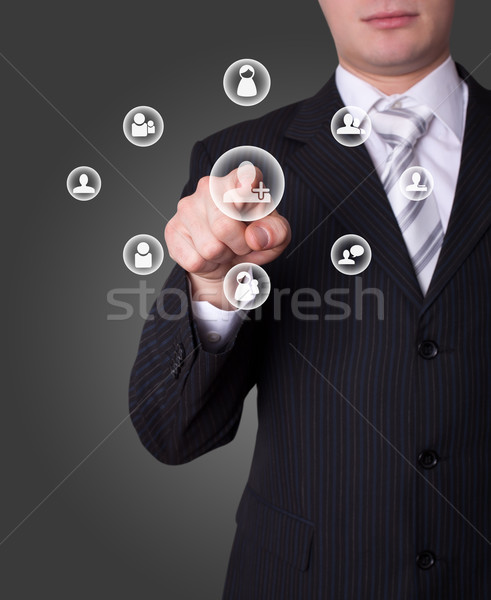 Homme réseau social bouton main affaires [[stock_photo]] © ra2studio