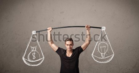 muscular man trying to get balanced  Stock photo © ra2studio