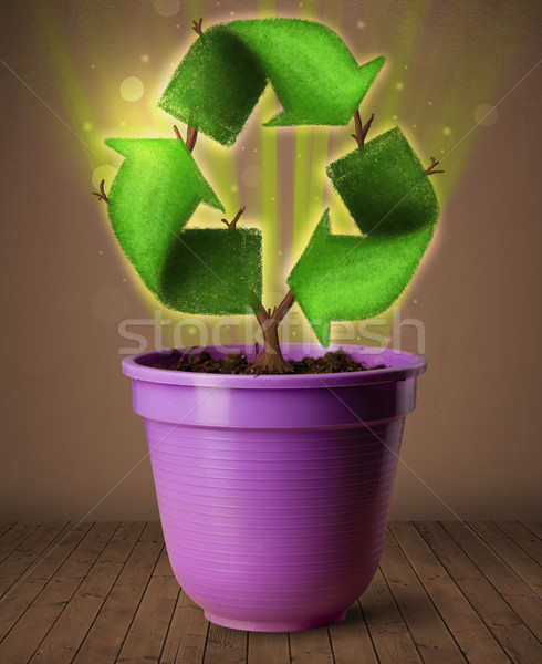 Recycler signe croissant sur pot à fleurs brillant [[stock_photo]] © ra2studio