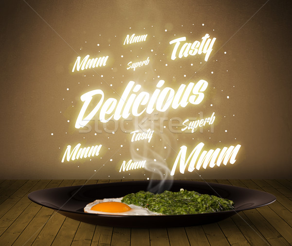 Food plate with delicious and tasty glowing writings Stock photo © ra2studio