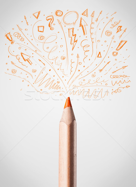 Pencil close-up with sketchy arrows Stock photo © ra2studio