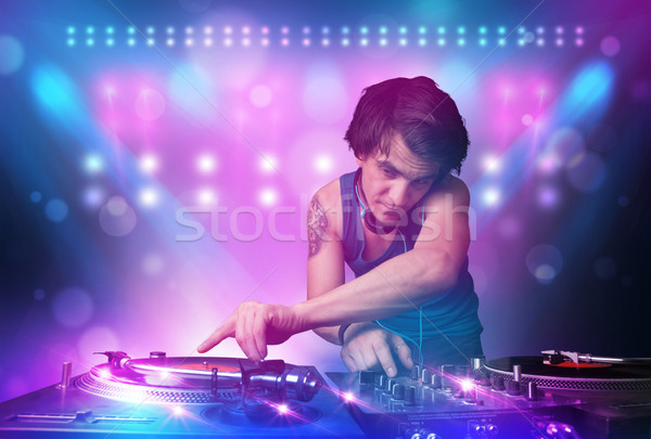 Disc jockey música tocadiscos etapa luces jóvenes Foto stock © ra2studio