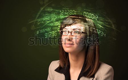 Mujer de negocios mirando alto tecnología número ordenador Foto stock © ra2studio