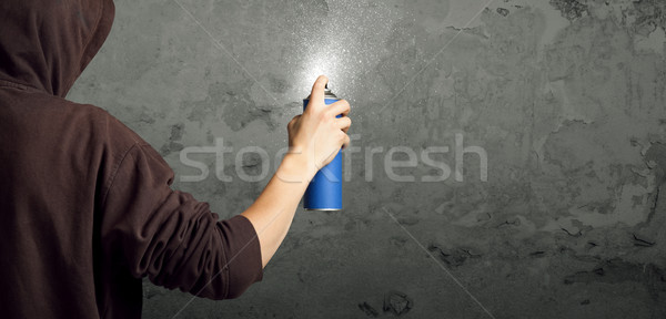 Young urban painter starting to draw Stock photo © ra2studio
