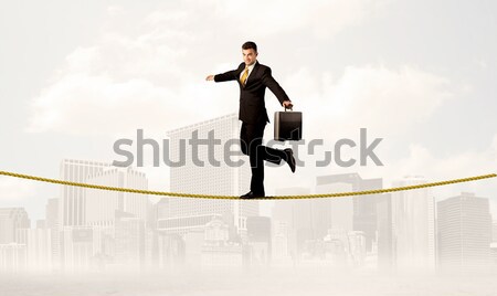 Energiek zakenman springen brug kloof man Stockfoto © ra2studio