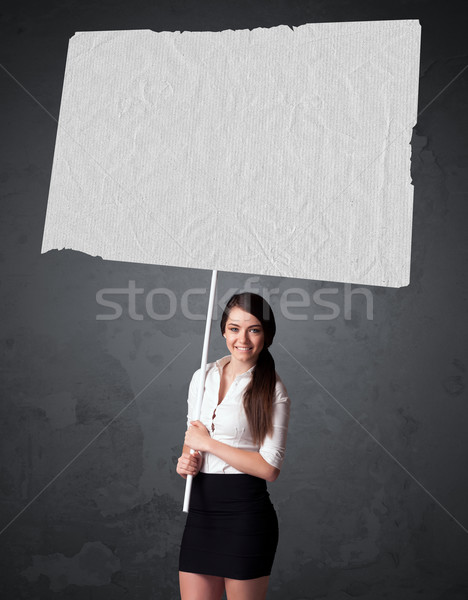 üzletasszony füzet papír fiatal tart nagy Stock fotó © ra2studio