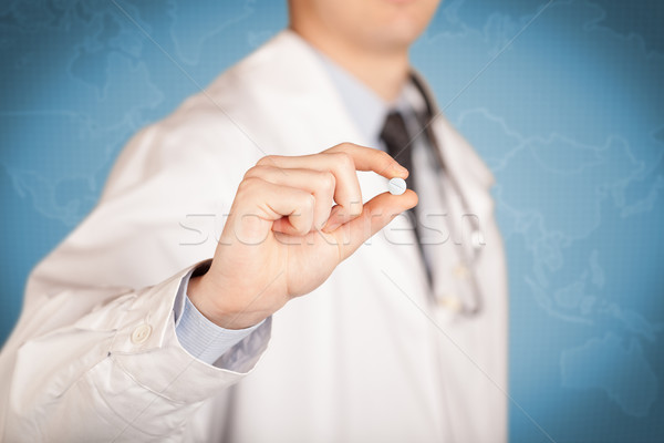 Medico bianco pillola medico di sesso maschile cappotto Foto d'archivio © ra2studio