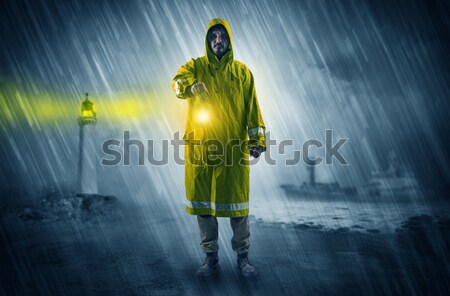 Terrorist in a room with weapons on his hand Stock photo © ra2studio