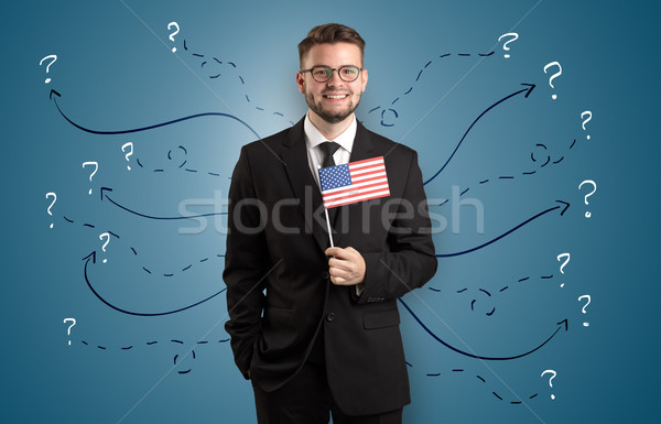 человека Постоянный флаг назначение улыбаясь молодым человеком Сток-фото © ra2studio